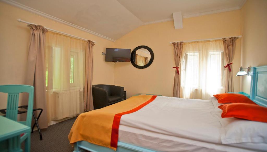 Postel nebo postele na pokoji v ubytování Hotel Bastion