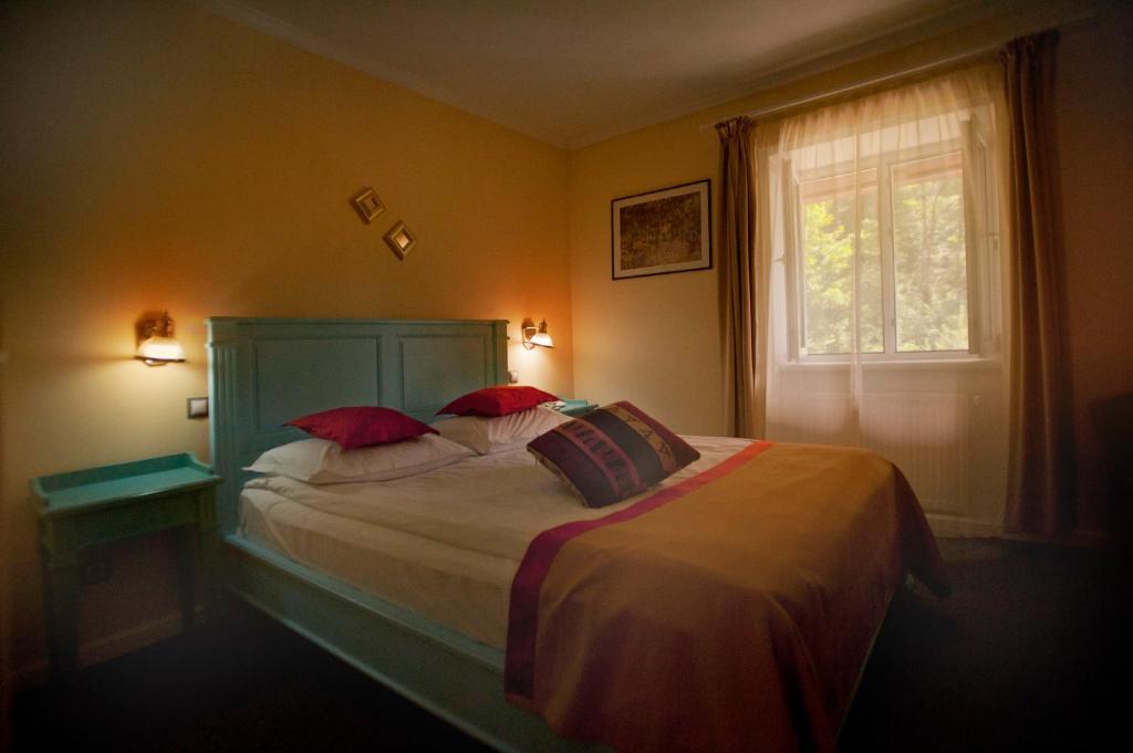 Postel nebo postele na pokoji v ubytování Hotel Bastion