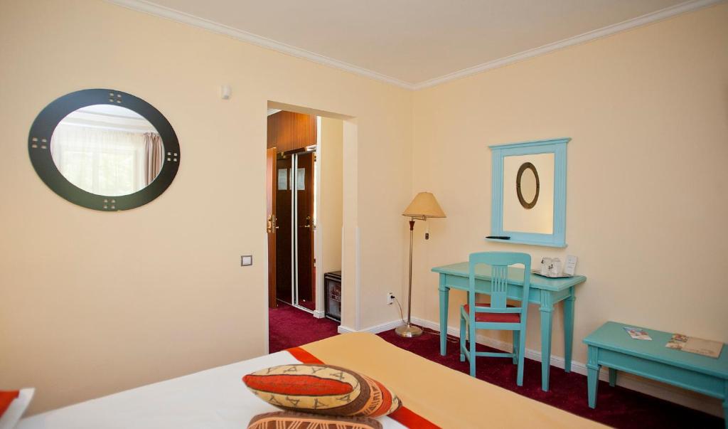 Postel nebo postele na pokoji v ubytování Hotel Bastion