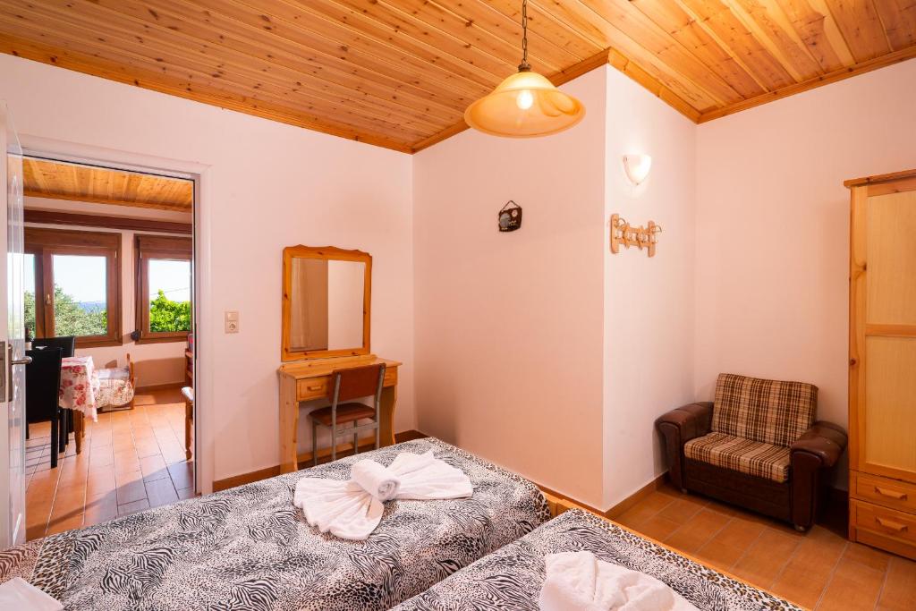 Postel nebo postele na pokoji v ubytování Archodissa Villa