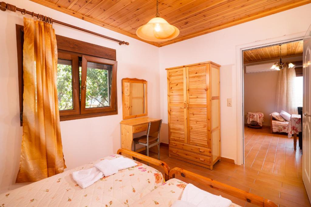 Postel nebo postele na pokoji v ubytování Archodissa Villa