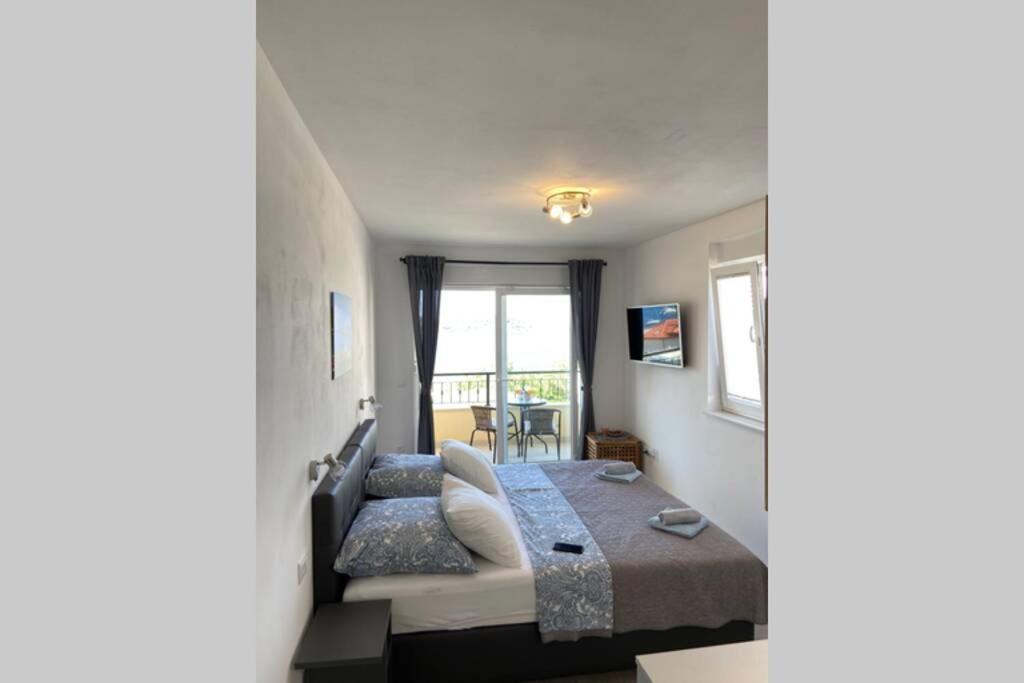 Posteľ alebo postele v izbe v ubytovaní A lovely and cozy room with a breathtaking view 2