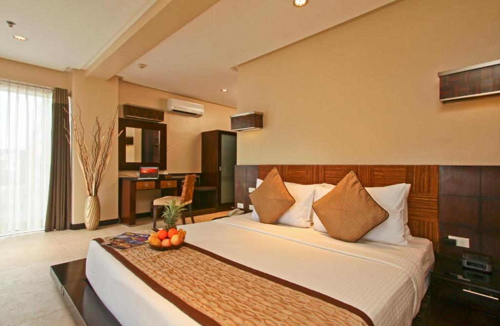 Postel nebo postele na pokoji v ubytování Two Seasons Boracay Resort