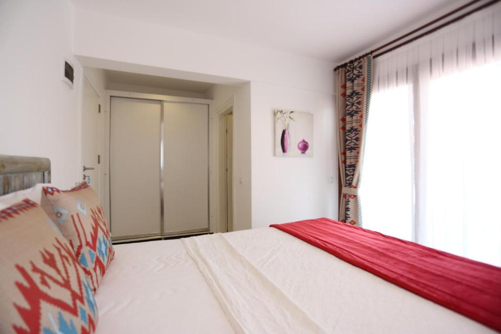 Postel nebo postele na pokoji v ubytování Mosso Boutique Hotel