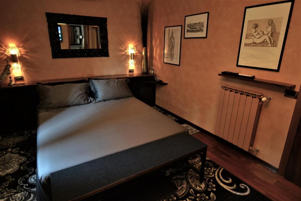 Postel nebo postele na pokoji v ubytování Triestè59 B&B