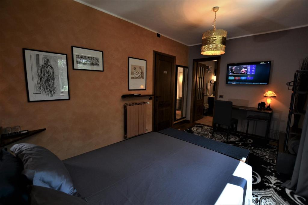 TV a/nebo společenská místnost v ubytování Triestè59 B&B