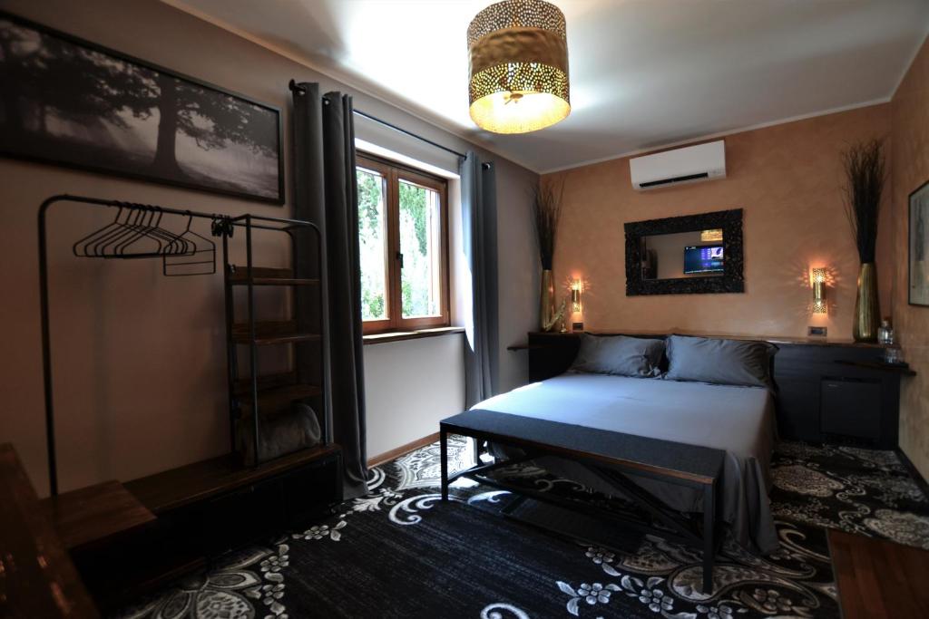 Postel nebo postele na pokoji v ubytování Triestè59 B&B