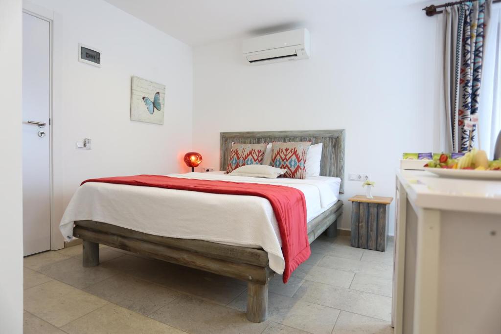 Postel nebo postele na pokoji v ubytování Mosso Boutique Hotel