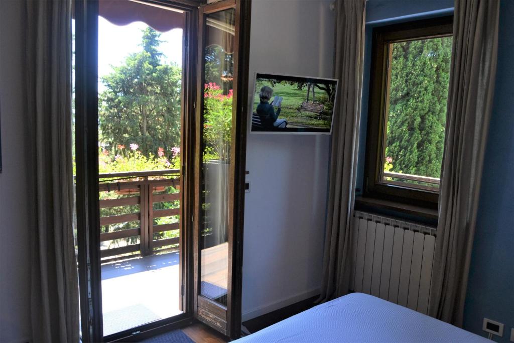 TV a/nebo společenská místnost v ubytování Triestè59 B&B