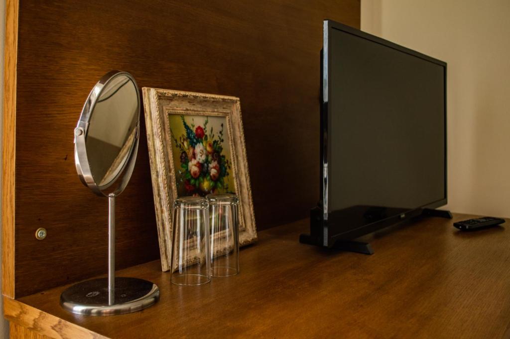 TV a/nebo společenská místnost v ubytování Aleksion Palace