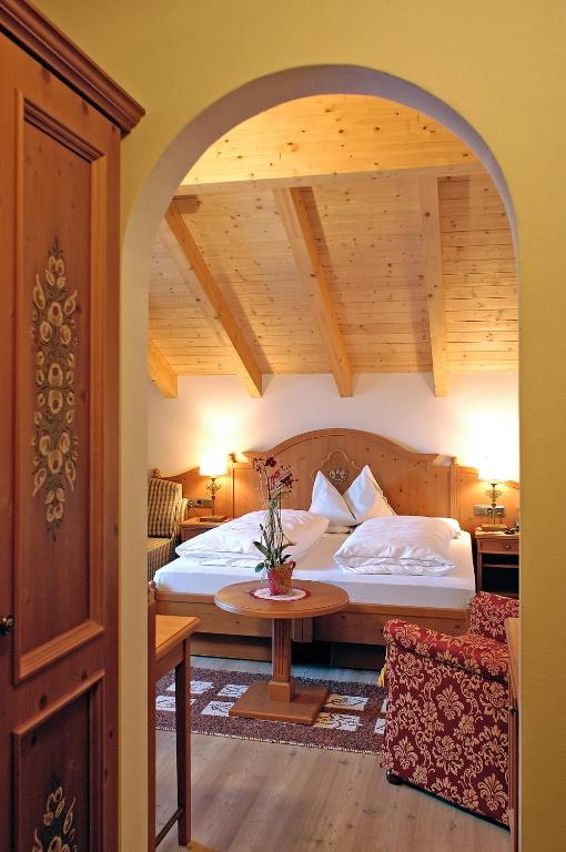 Postel nebo postele na pokoji v ubytování Apartments Hubertushof