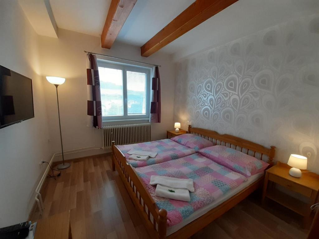 Postel nebo postele na pokoji v ubytování Penzión Šefčík
