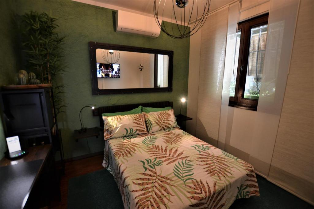 Postel nebo postele na pokoji v ubytování Triestè59 B&B