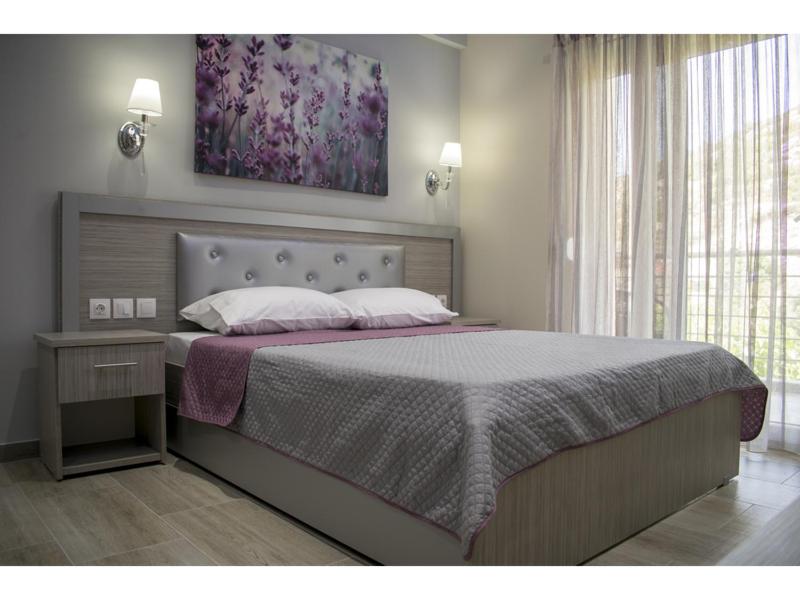 Postel nebo postele na pokoji v ubytování House Diakos Toroni