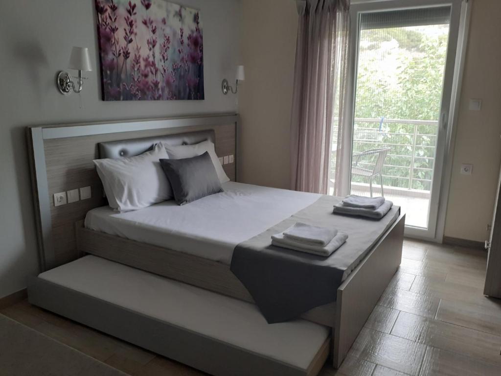 Postel nebo postele na pokoji v ubytování House Diakos Toroni
