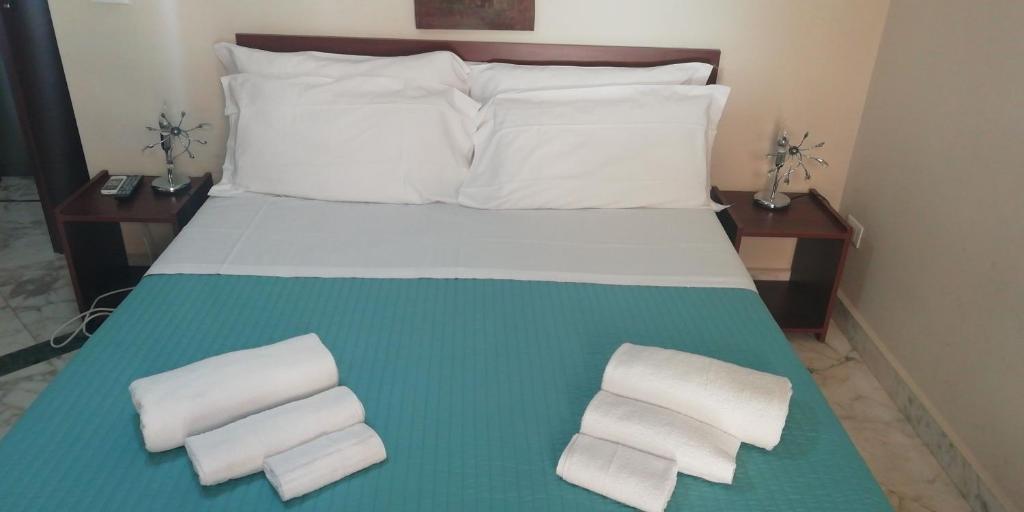 Posteľ alebo postele v izbe v ubytovaní B&B Le Vie D'Arte