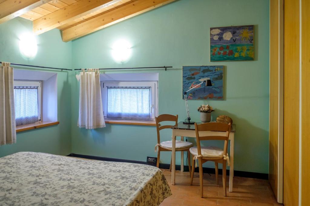 Krevet ili kreveti u jedinici u okviru objekta Al Sasseto B&B