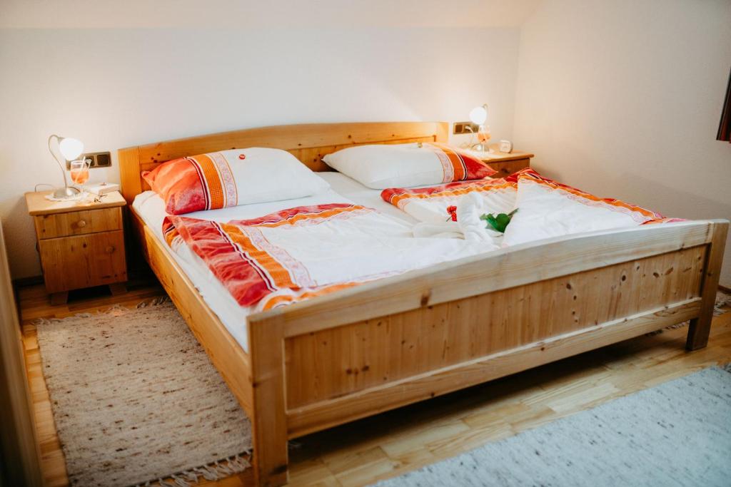 Postel nebo postele na pokoji v ubytování Appartement VIDMAR-WINTERTRAUM