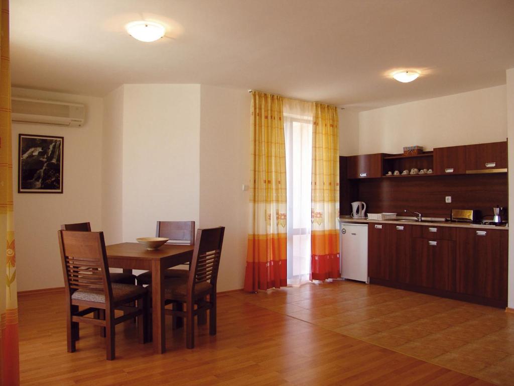 Kuchyň nebo kuchyňský kout v ubytování Guest Apartments Co Morenia