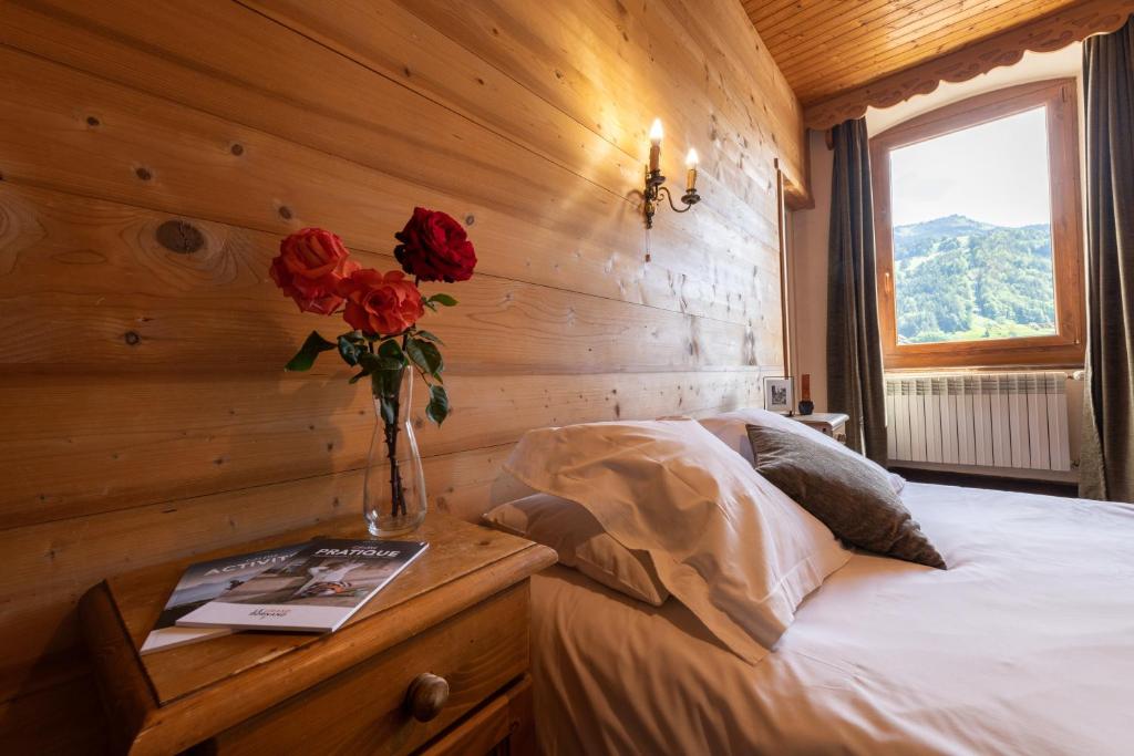 Postel nebo postele na pokoji v ubytování Hotel la Pointe Percee