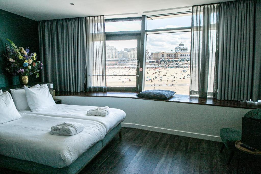 Postel nebo postele na pokoji v ubytování De Pier Suites