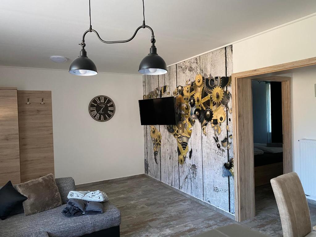 TV a/nebo společenská místnost v ubytování Dióliget Cottage Sárvár