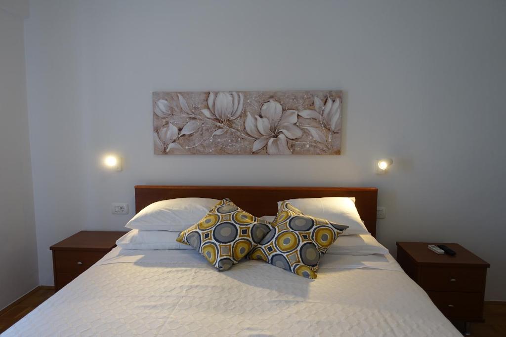 Postel nebo postele na pokoji v ubytování Room Novakovic