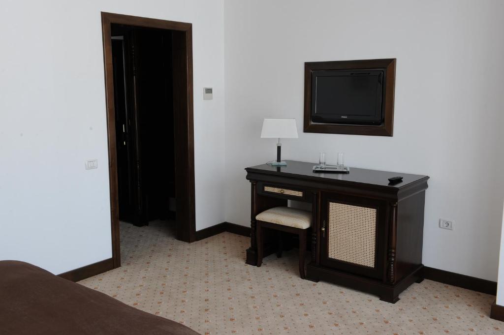 TV a/nebo společenská místnost v ubytování Hotel Zodiac