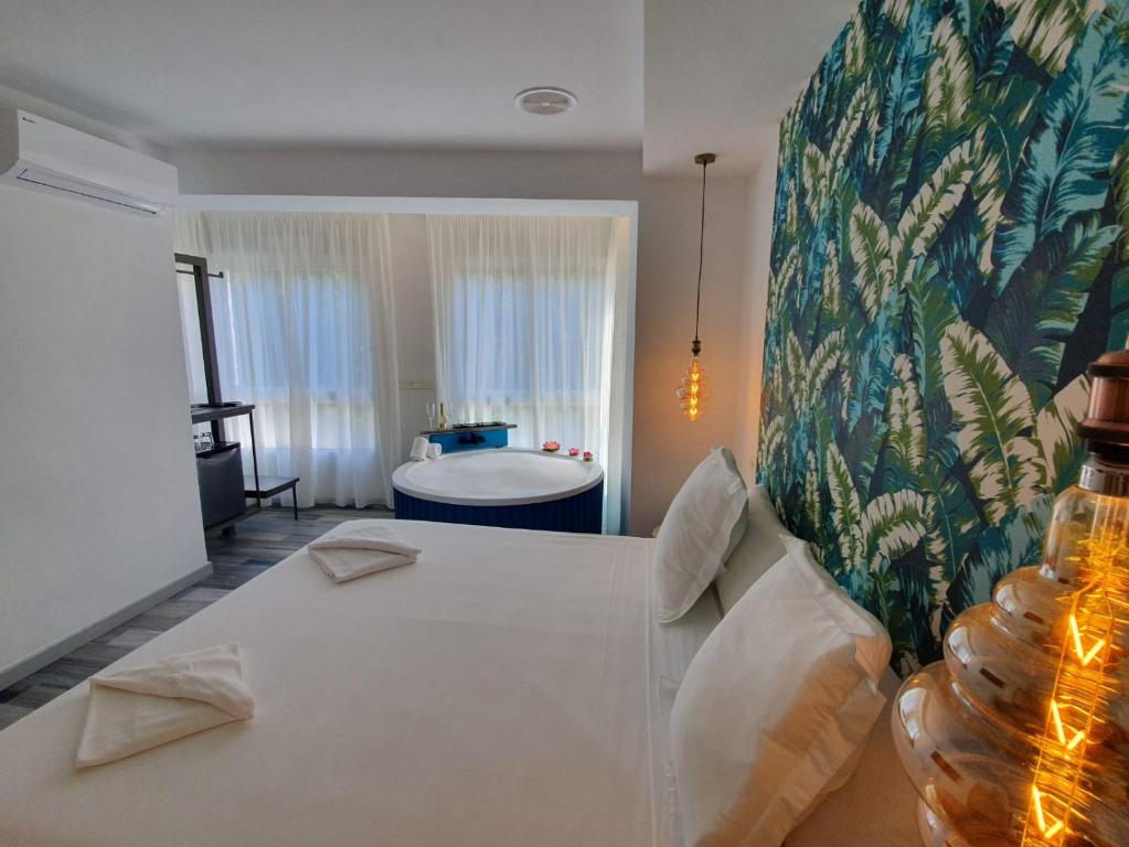 Postel nebo postele na pokoji v ubytování Reina Victoria Prado Sastre