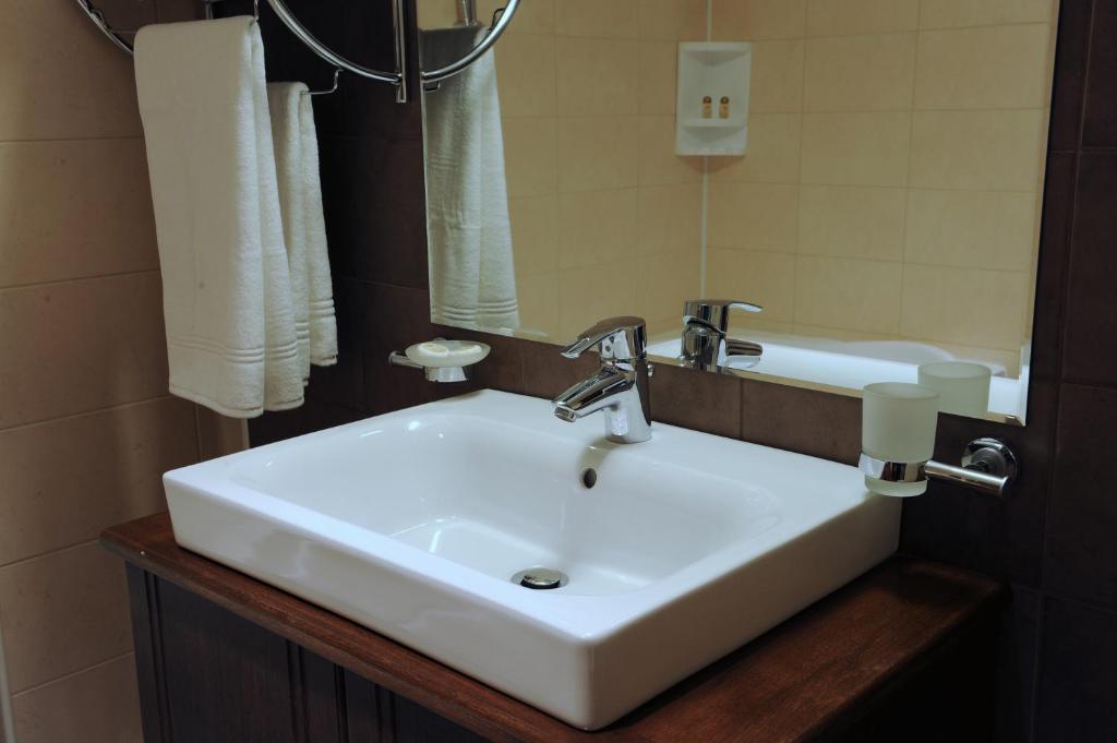 Koupelna v ubytování Hotel Zodiac