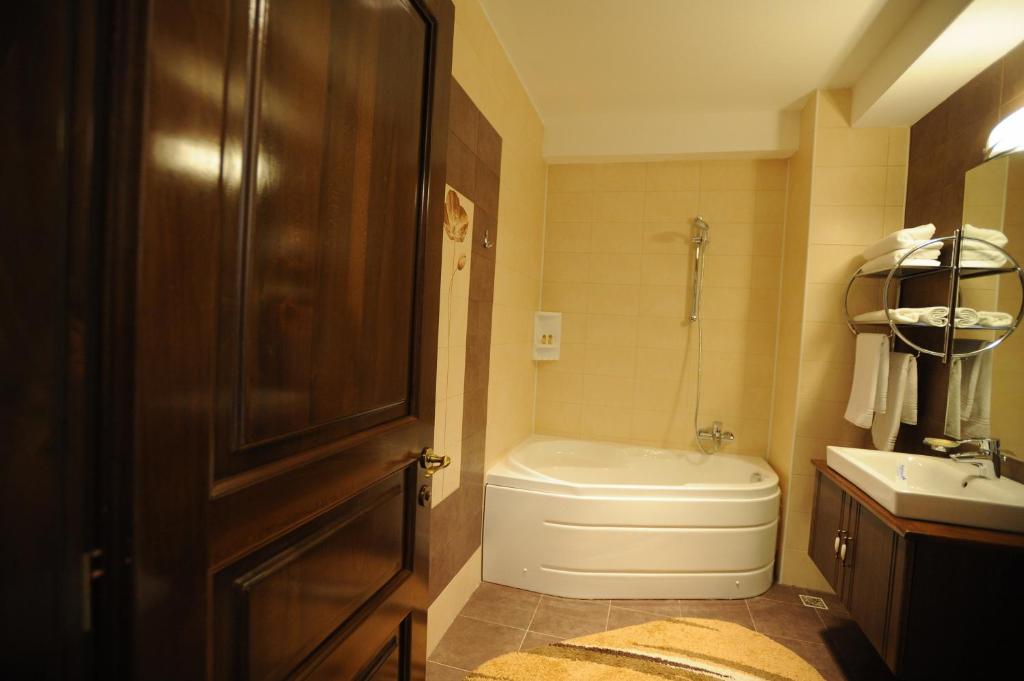 Koupelna v ubytování Hotel Zodiac