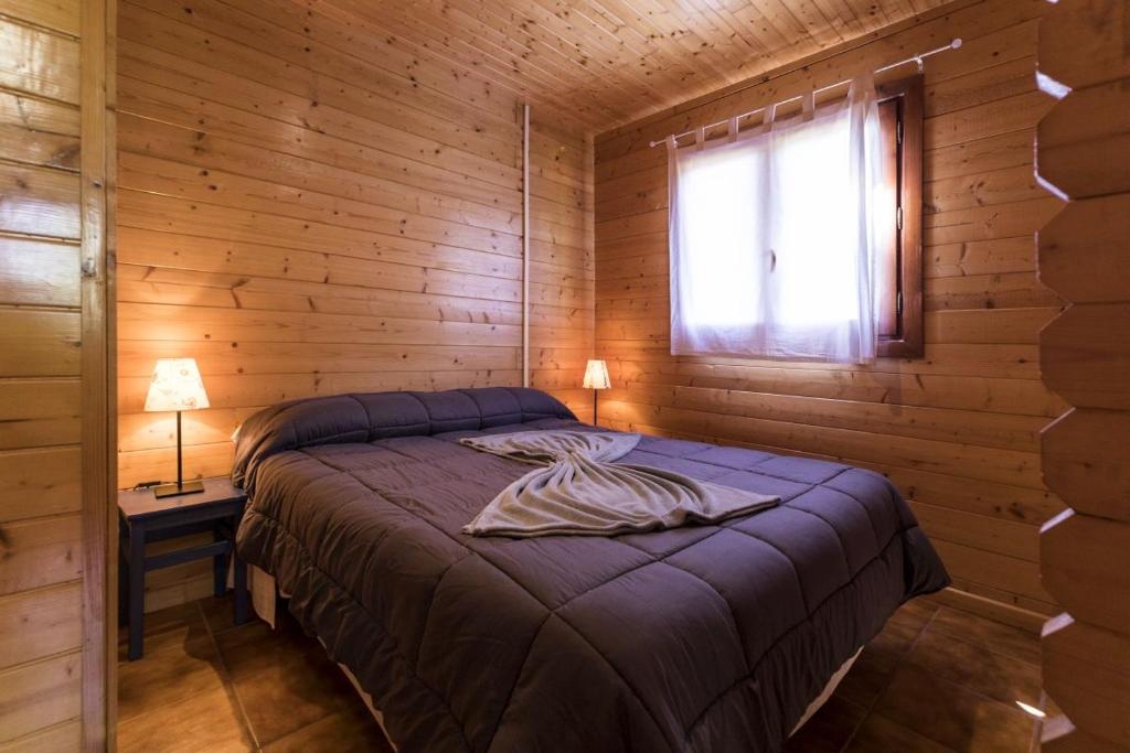 Cama o camas de una habitación en Camping Globo Barcelona