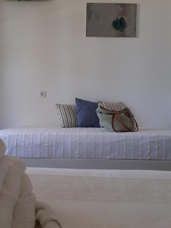 Postel nebo postele na pokoji v ubytování ViewLight Sifnos Living