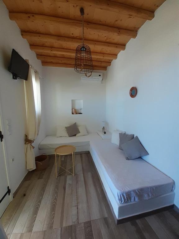 Postel nebo postele na pokoji v ubytování ViewLight Sifnos Living