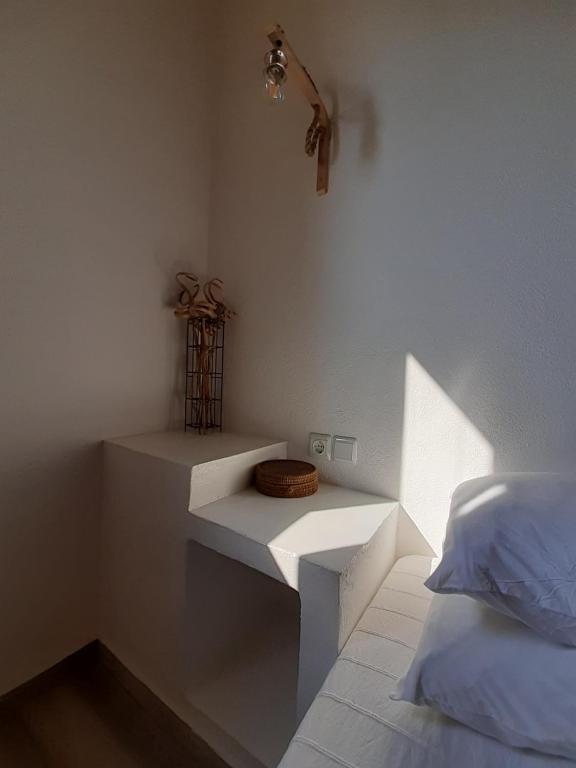 Postel nebo postele na pokoji v ubytování ViewLight Sifnos Living