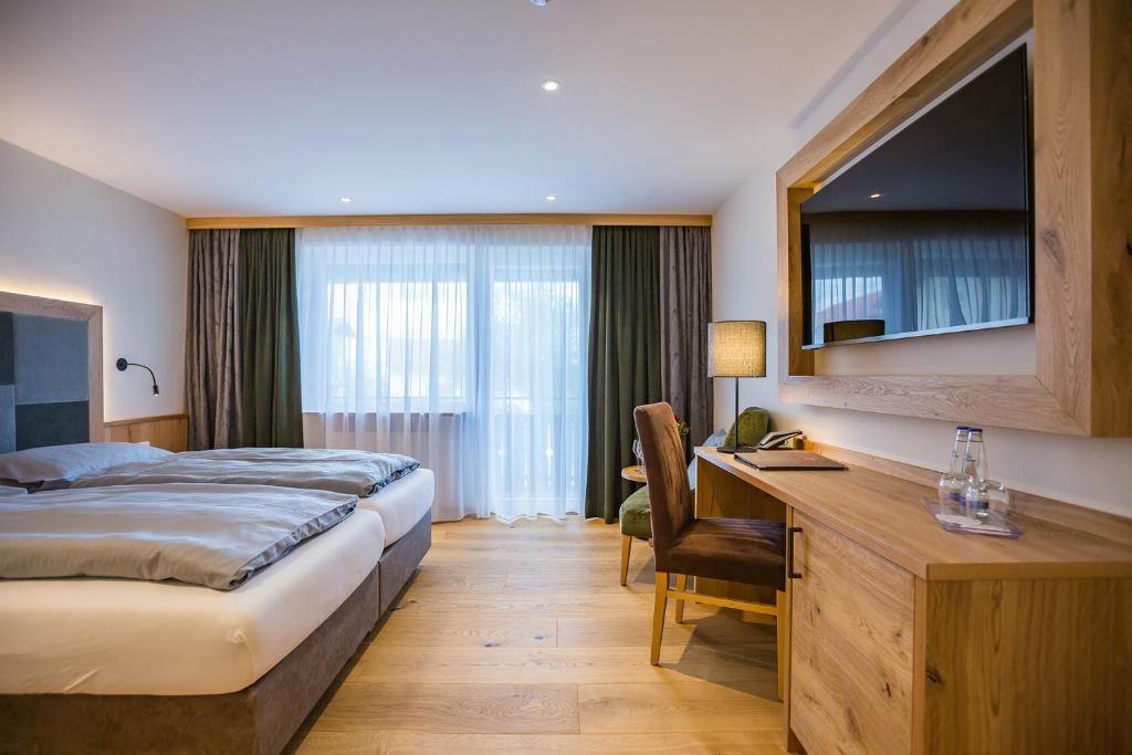 Postel nebo postele na pokoji v ubytování Hotel Friedenseiche