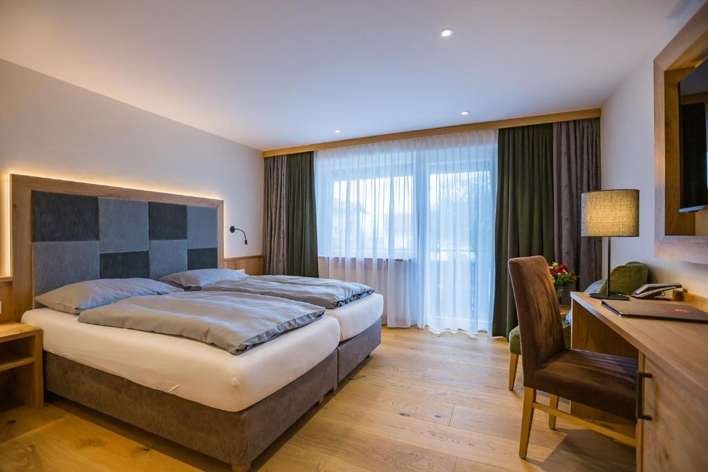 Postel nebo postele na pokoji v ubytování Hotel Friedenseiche