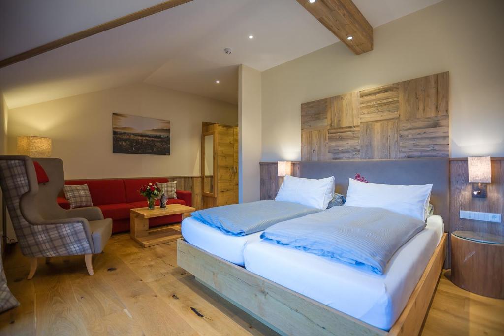 Postel nebo postele na pokoji v ubytování Hotel Friedenseiche