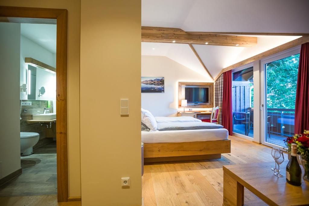 Postel nebo postele na pokoji v ubytování Hotel Friedenseiche