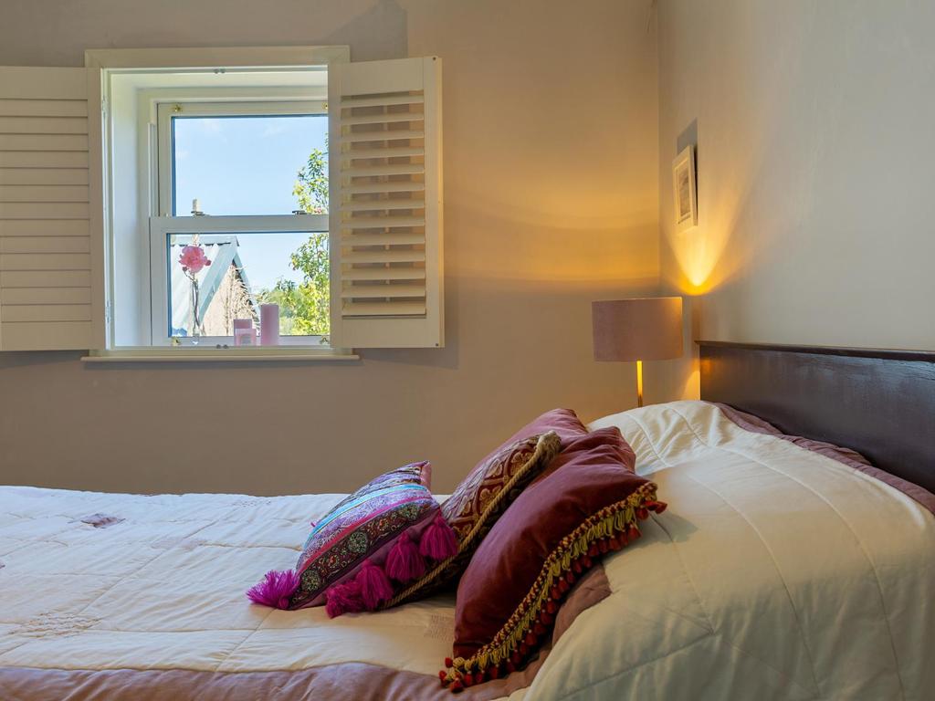 Postel nebo postele na pokoji v ubytování Coolcormack Stud B&B
