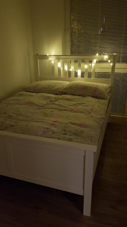 Posteľ alebo postele v izbe v ubytovaní Apartament Zamkowy