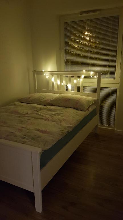 Posteľ alebo postele v izbe v ubytovaní Apartament Zamkowy
