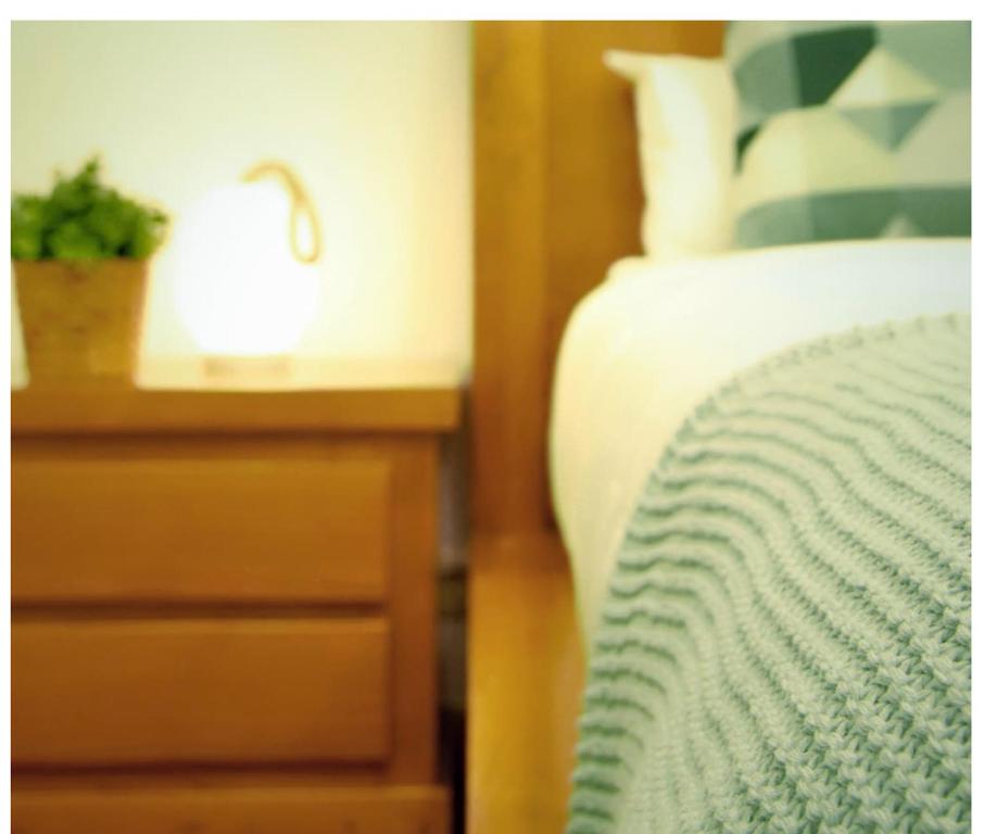 A bed or beds in a room at Botería