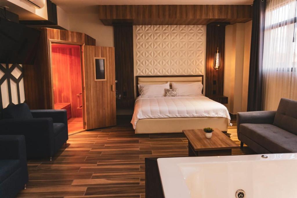 Postel nebo postele na pokoji v ubytování Hotel San Carlos