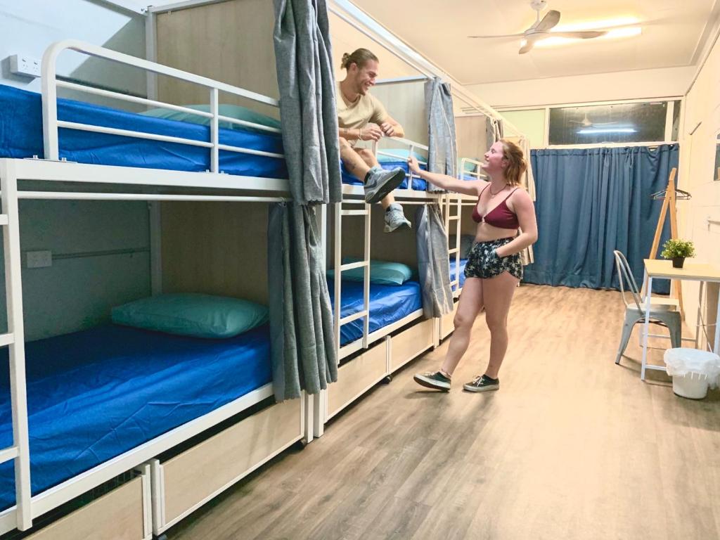 Postel nebo postele na pokoji v ubytování Mumma's Hostel Cairns