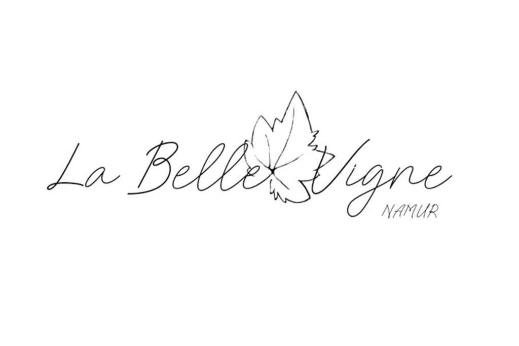 a calligraphy inscription la belle cuisine with a maple leaf at La Belle Vigne in Namur