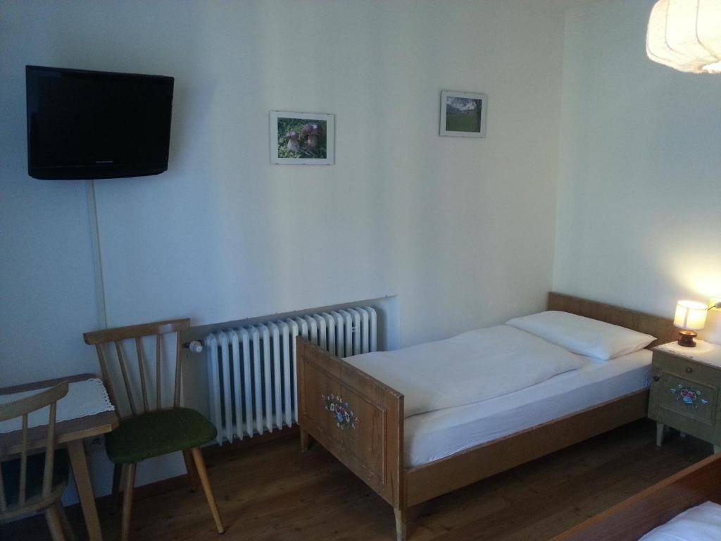 Postel nebo postele na pokoji v ubytování Pension Panorama