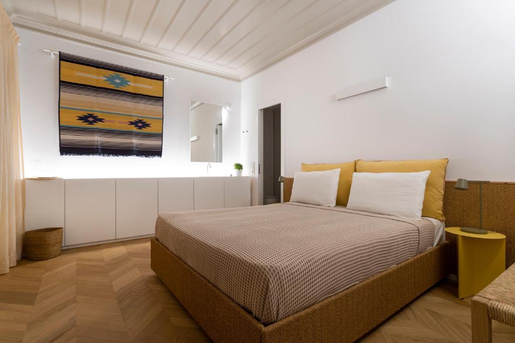 Postel nebo postele na pokoji v ubytování Guesthouse Niriides