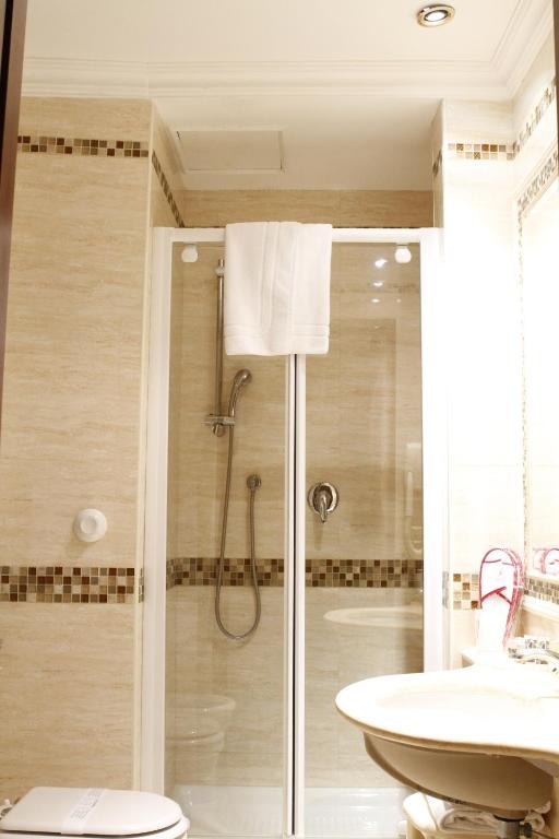 Koupelna v ubytování Hotel Genio