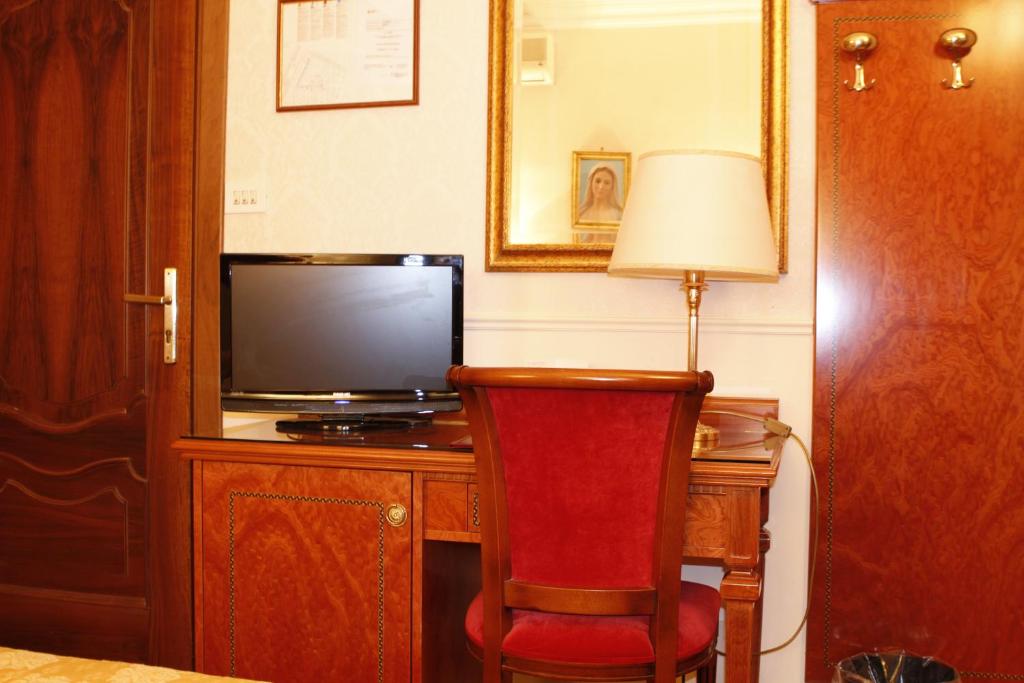 Kuchyň nebo kuchyňský kout v ubytování Hotel Genio
